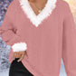 Weihnachtlicher Pullover mit Kunstfellbesatz