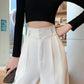 Schwarze weite Freizeithose mit Knopfdetails - Mia